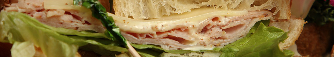 Eating Sandwich Cafe Salad at Phillips Ranch Health Bar restaurant in Pomona, CA.